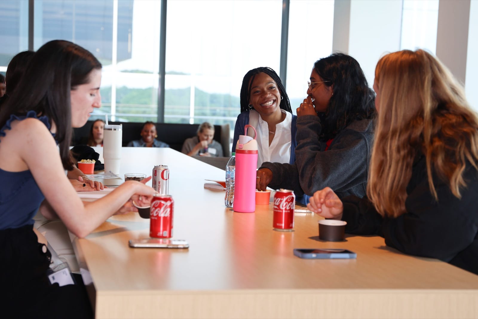TK Elevator interns at a table
